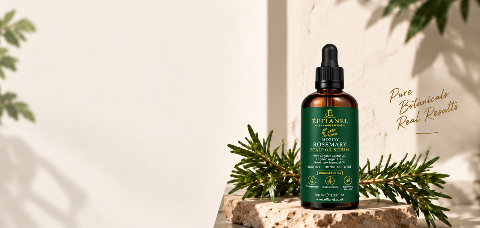 Effianel rosemary scalp oil serum on stone with fresh rosemary